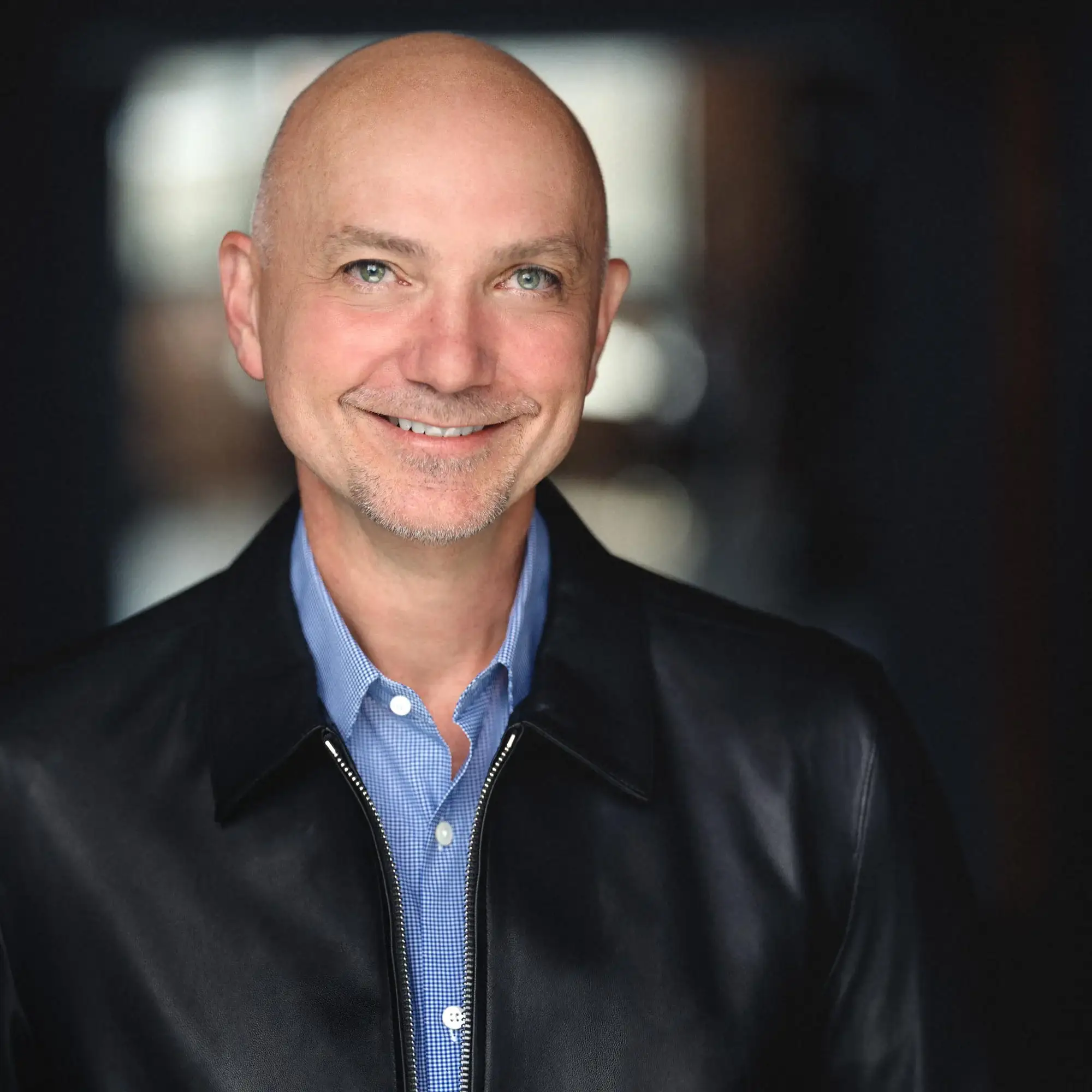 Headshot of distinguished gentleman in leather jacket Premium Actor headshot of a man in a leather jacket, showcasing a confident expression, ideal for casting calls and promotional materials