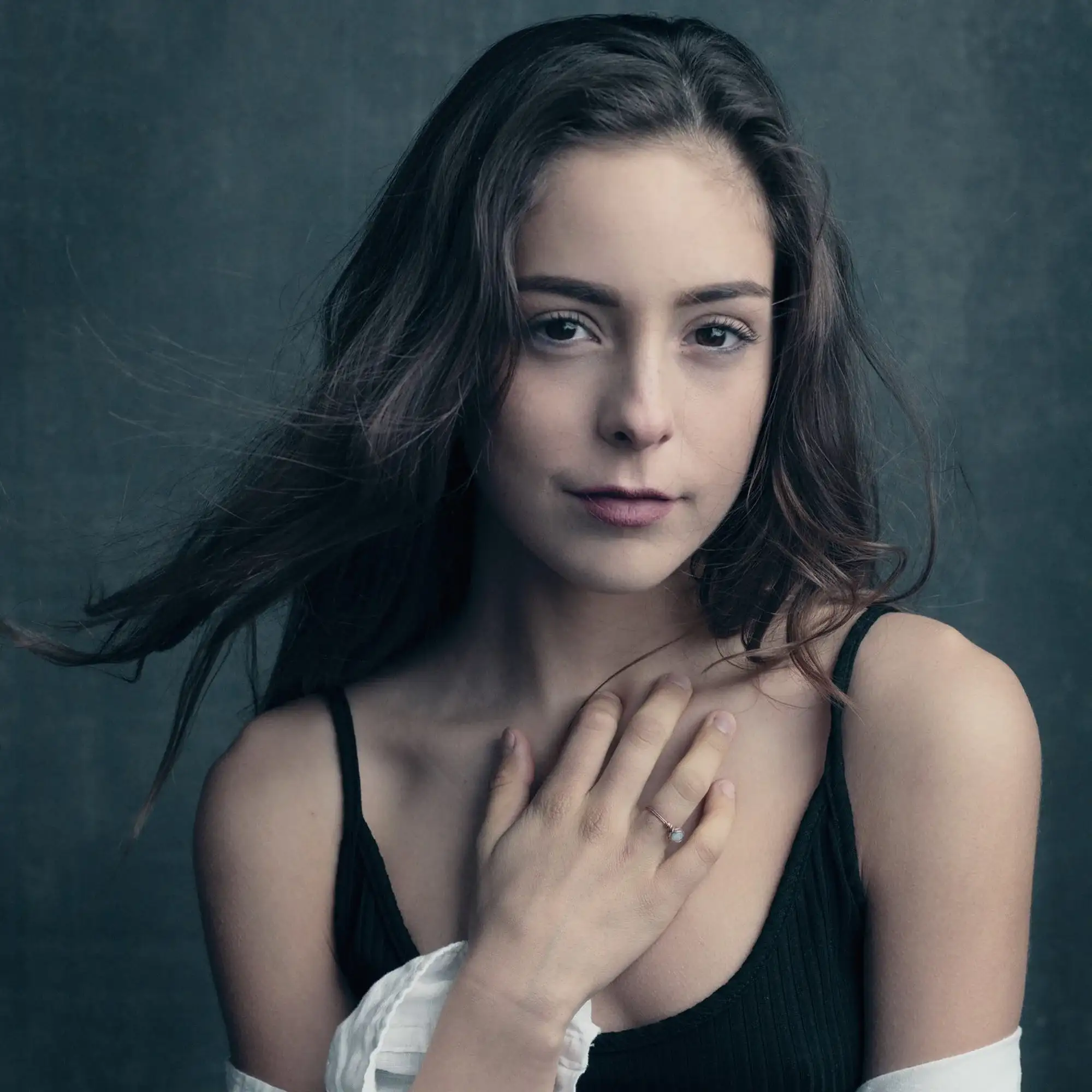 Haunting Elegance: Jenna Albulet’s Riveting Portrait by 312 Elements Jenna Albulet's ethereal beauty shines in this haunting close-up, her porcelain skin and intense expression creating a captivating atmosphere in Schacht's Fulton Market studio.